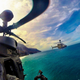 Illustration for article titled Check Out This Award Winning Pic Of OH-58Ds Skirting The Hawaiian Coast